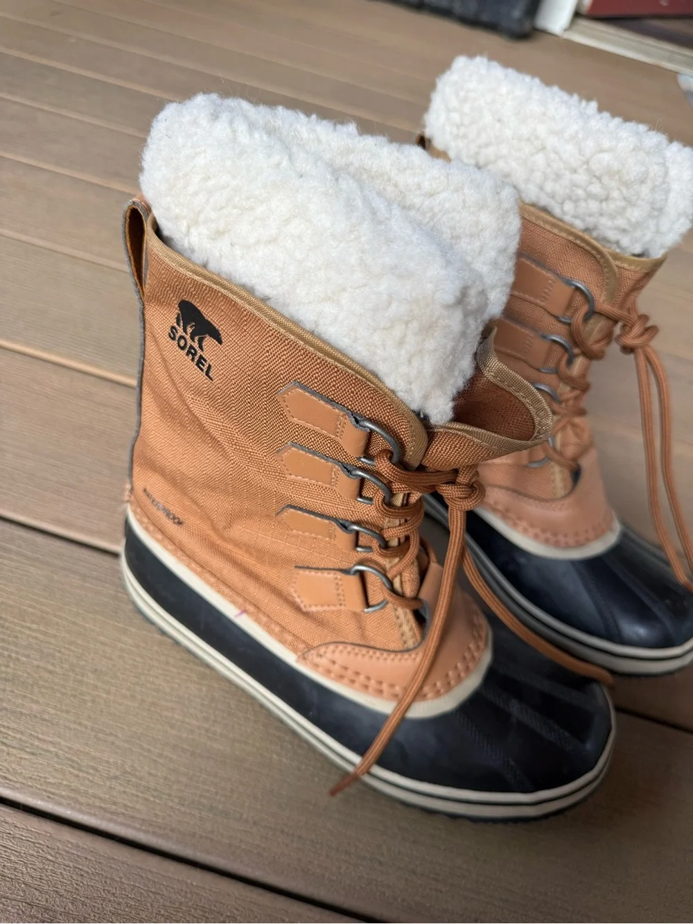 SOREL Insulated Lace-Up Duck Boots in Black and Brown